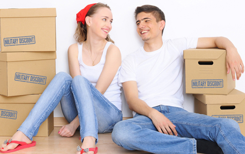 Exhausted Couple sitting among moving boxes - Packing boxes, Moving Tips for Home Sellers, Moving Advice for Home Buyers, - Bill Salvatore, Arizona Elite Properties 602-999-0952