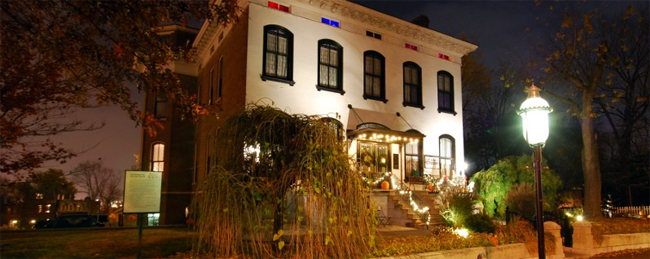 White colonial Mansion at night, Lemp Mansion by Matthucke-own-work-via-Wikimedia-Commons