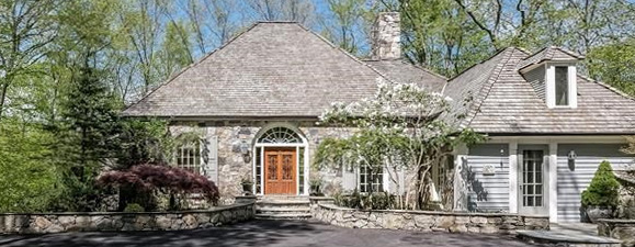 Gray stone home with mansard roof and wood double entry doors - Cyndi Lauper's Stamford CT home for sale (photo: RIS Media) - Bill Salvatore, Arizona Elite Properties 602-999-0952 - Arizona Real Estate