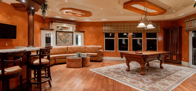 spacious room with wood floors, columns, walls and ceiling accents - luxury home, wood floors, wood accents - Bill Salvatore, Arizona Elite Properties 602-999-0952 - Arizona Real Estate Luxury Homes