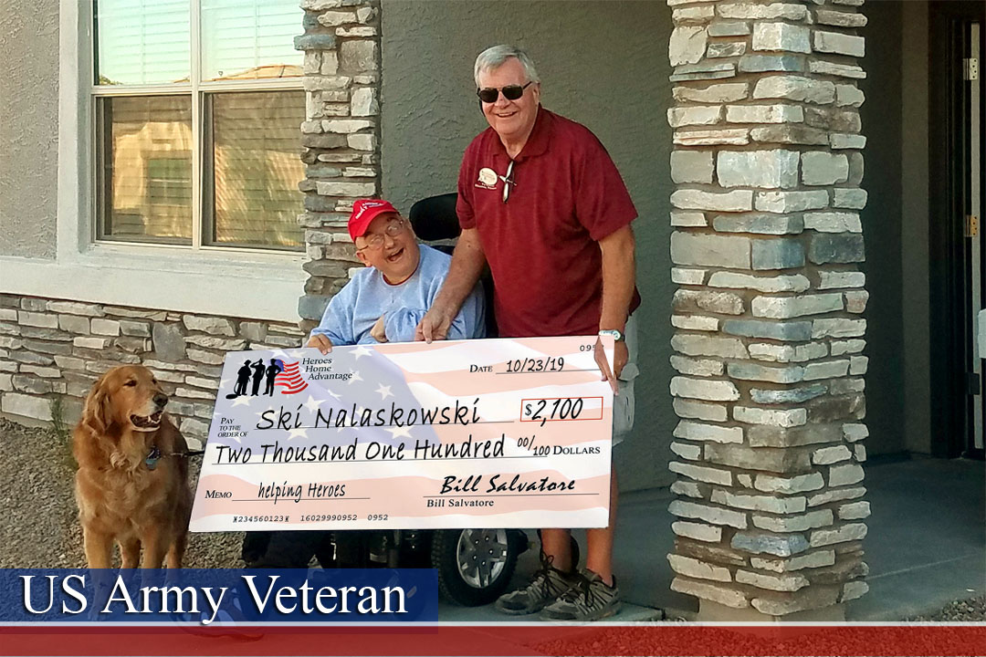 veteran in wheelchair holding giant check, service dog to left, Realtor standing on right - AZVHV Veterans Helping Veterans, discounts for Veterans buying or selling Real Estate - Bill Salvatore, Your Valley Property - Arizona Elite Properties 602-999-0952
